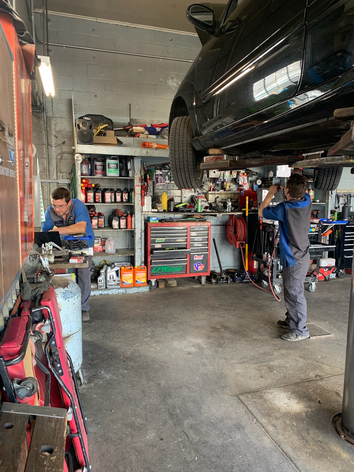 Mechanics working in the shop