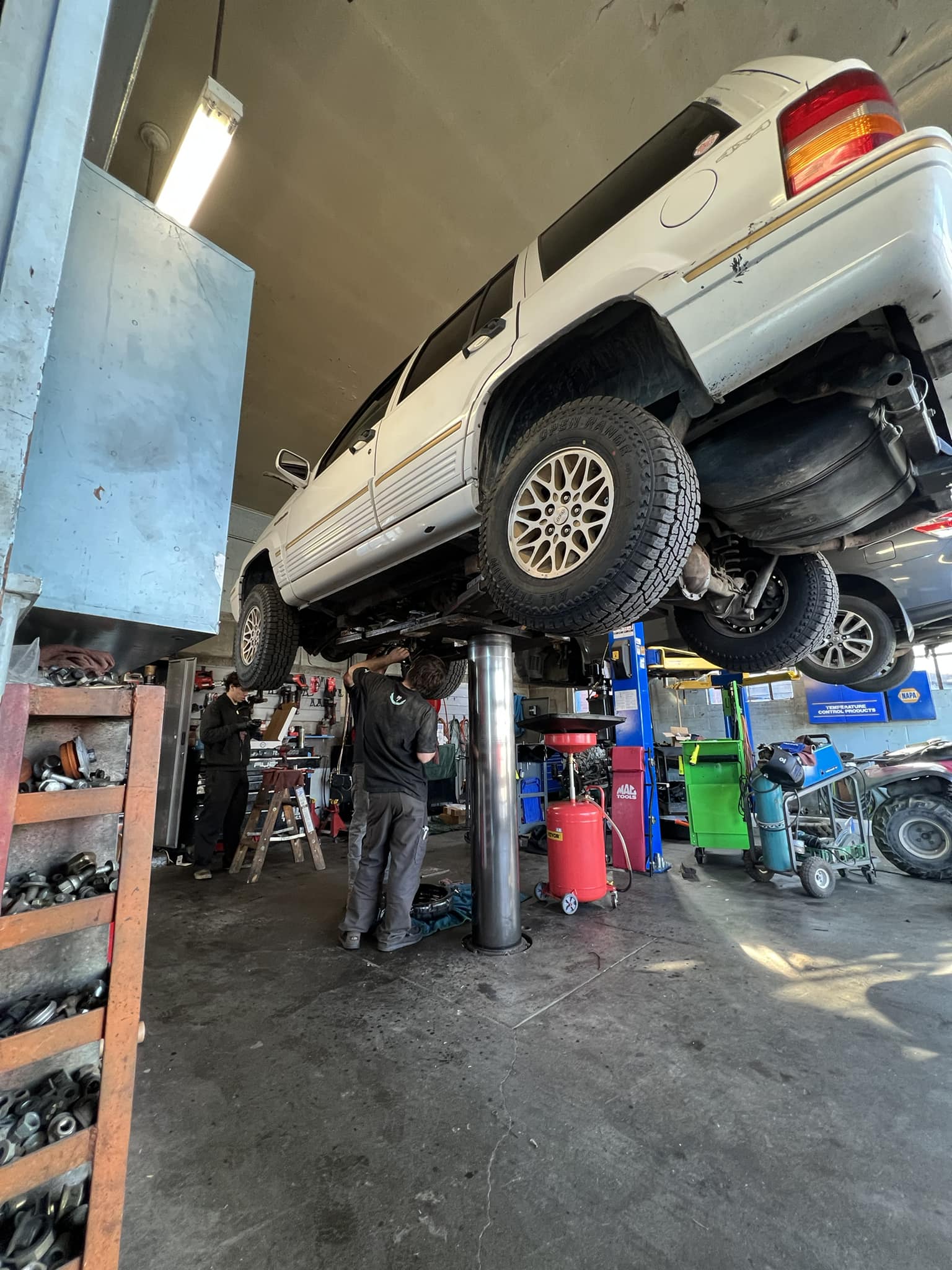 SUV on the lift for service
